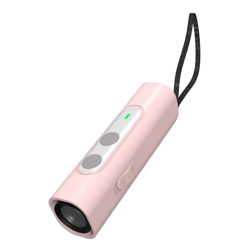 Ultrasonic dog repeller in use during a dog walk